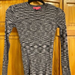 Black, grey, white mix long sleeve shirt.